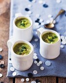 Pea and chicken soup in cups