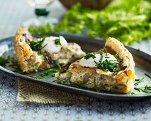 Mushroom quiche with chives and sour cream