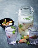 White wine sangria with white peaches and mint