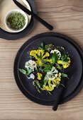 Cauliflower carpaccio with a watercress and almond dressing