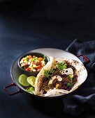 Pita bread filled with lamb and beans