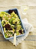Tortellini salad with prawns, green asparagus, lettuce and dill