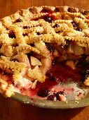 Apple and berry pie, sliced (close-up)