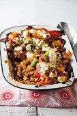 Vegetarian pasta bake with vegetables and ricotta