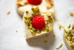 White chocolate heats with pistachios and raspberries