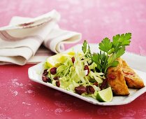 Cabbage salad with cranberries and smoked fish