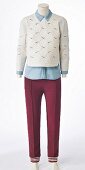 A denim shirt, white cotton jumper and burgundy trousers on a headless mannequin