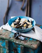 Pasta with hake and mussels in a creamy sauce