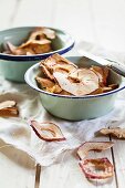 Organic apple chips in bowls