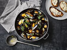 Mussels in a wine broth with Gorgonzola crostini