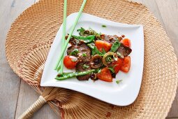 Beef teriyaki with tomatoes, mange tout and onions (Japan)