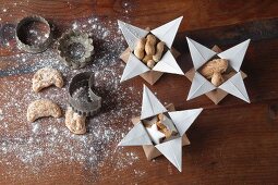 Christmas biscuits in origami star-shaped gift boxes