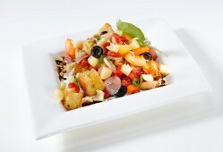 A Greek salad with couscous