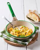 Scrambled eggs with sweetcorn in a small pan