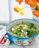 Spaghetti with pesto and goat's cheese