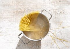 Spaghetti in a pot of boiling water