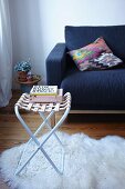 Hand-made stool with woven leather seat