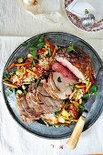 Roast lamb with couscous and vegetables