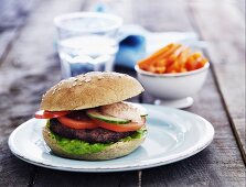 Hamburger with tomatoes and cucumber