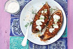 Baked aubergines stuffed with minced meat, pine nuts and yoghurt