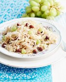 White cabbage with grapes and nuts