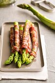 Asparagus wrapped in ham