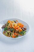 Wholemeal spaghetti with beef, carrots and wild garlic