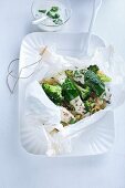 A fish parcel with broccoli and herb yoghurt