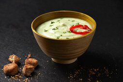 Cauliflower and coconut milk soup with coriander and almond croutons (Paleo diet)