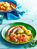 Spiced tomato and onion with grilled sausages