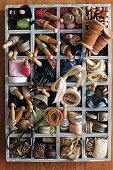 Vintage-style wooden case of organised ribbons