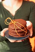 Chocolate cookies tied with string