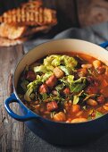 Kale soup with beans, potatoes and bacon