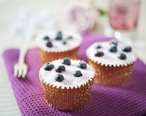 Cupcakes with sugared blueberries