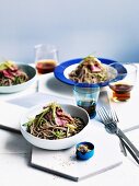 Glazed beef steak with soba noodles and cucumber