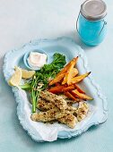 Fish fingers with almond breading and sweet potato fritters