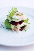 An apple millefeuille with beetroot and smoked trout