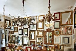 Various picture and mirror frames in artist's studio