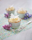 White chocolate cupcakes decorated with buttercream