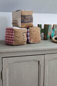 Decorative cubes and letters on top of cabinet