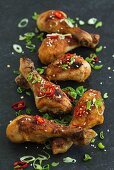 Chicken drumsticks with chilli and spring onions