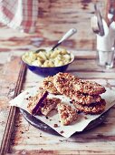 Vegetable escalopes with a walnut crust served with potato salad