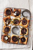 Onion tarts with blue cheese and thyme