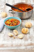 Vegetable goulash with courgettes, pepper and aubergines served with bread rolls