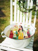 Chilled drinks in an enamel tub for a mid-summer festival