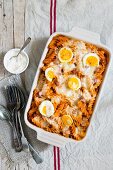 Fusilli bake with a salsiccia and tomato sauce and hard-boiled eggs