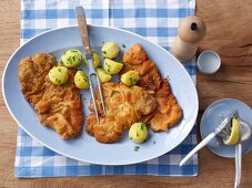 Wiener Schnitzel (breaded veal escalope) with parsley potatoes