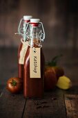 Homemade ketchup in flip-top bottles