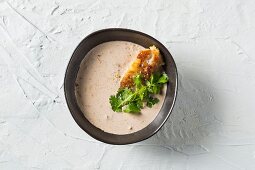 Coconut soup with fried fish fillet
