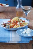 Spaghetti with vegetable bolognese and sheep's cheese